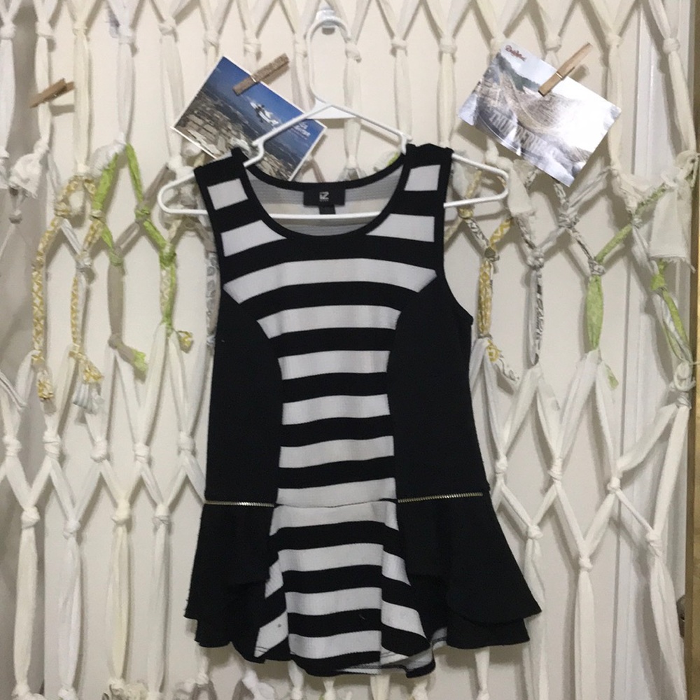 Black and white striped peplum top